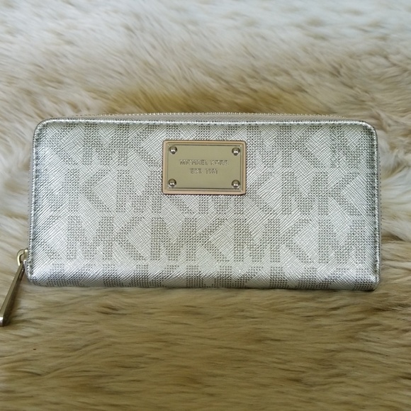 Michael Kors Handbags - Michael Kors Silver Wallet
